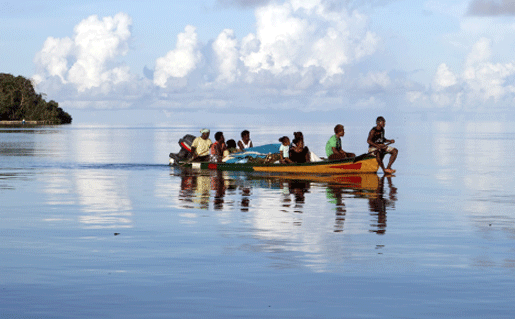 Solomon Islands locals on a boat